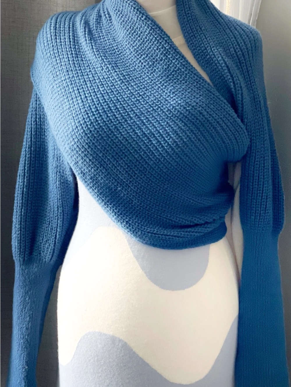 Freya Harper London Wrap-Style Off-the-Shoulder Knit Sweater in Cornflower Blue